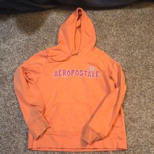 A coral Aeropostale sweatshirt.